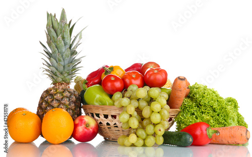 Composition with vegetables and fruits in wicker basket