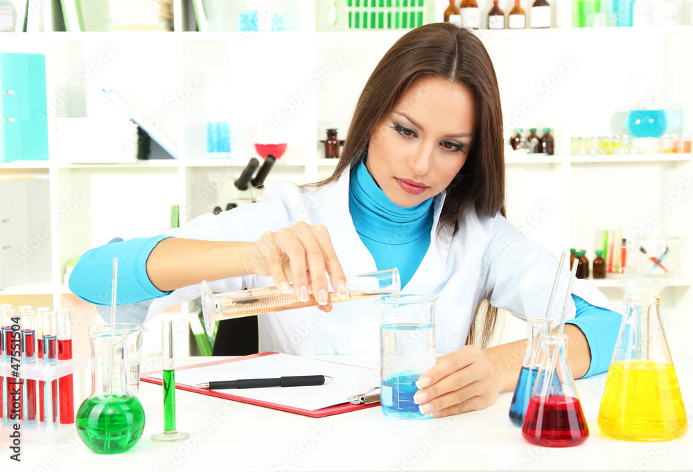 Young scientist in laboratory. Young scientist in laboratory.