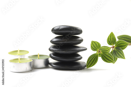 aromatherapy candles and massage pebbles