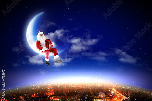 Santa on the moon © Sergey Nivens