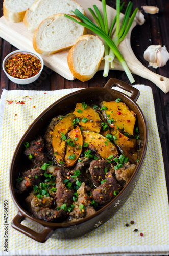 Marinated meat baked with pumpkin and spices