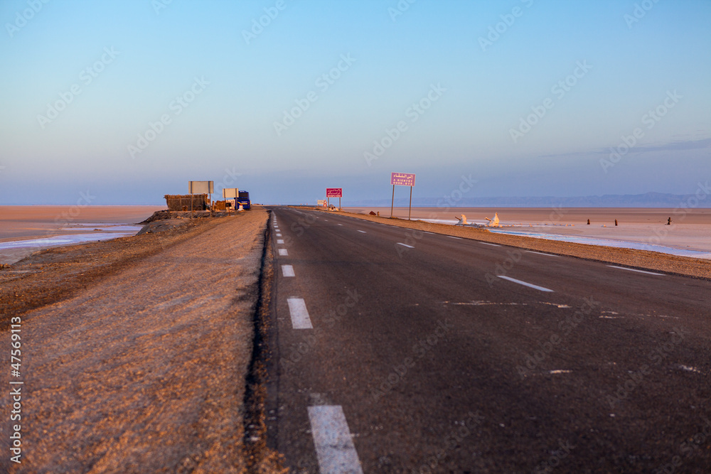 Empty road in sold lakes desert, Africa