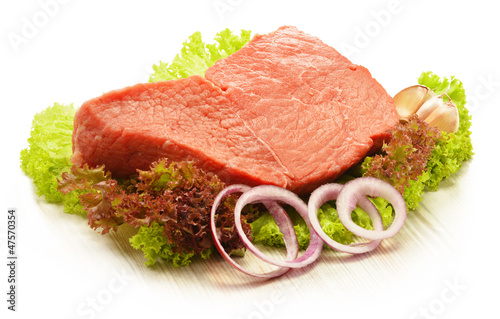 Photo Composition with piece of beef meat and lettuce