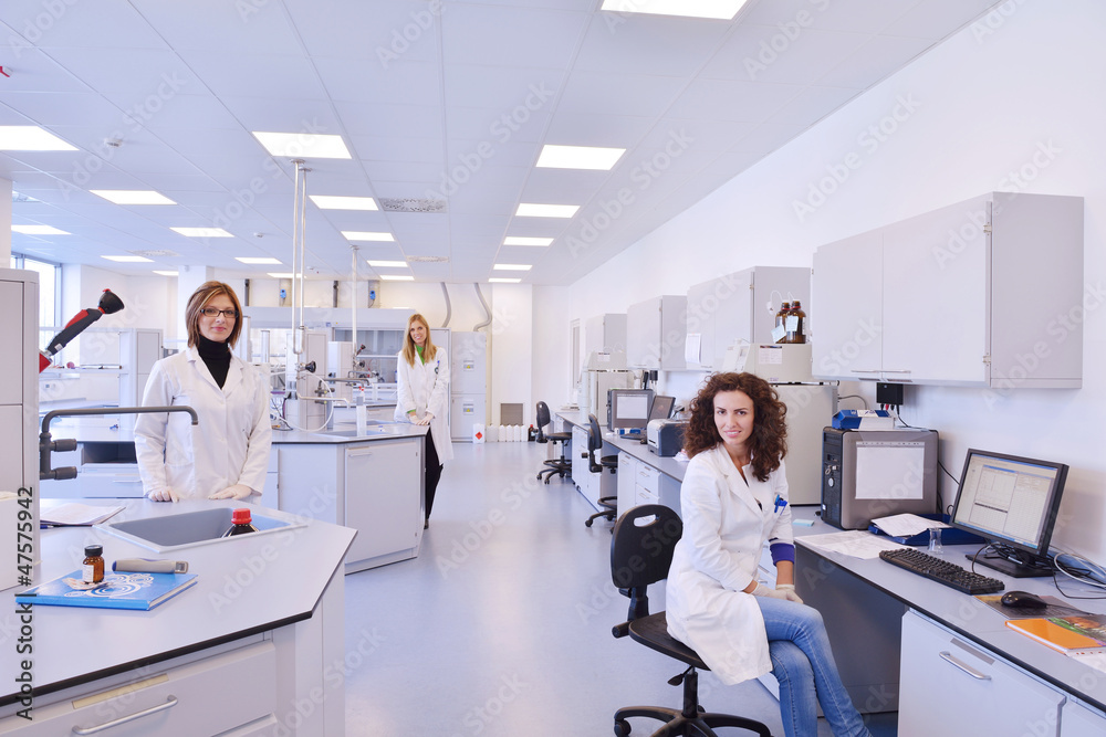 scientists working at the laboratory scientists working at the laboratory