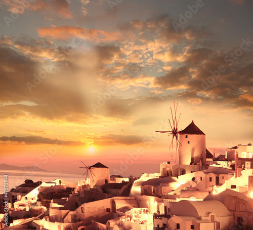 Windmills in Santorini against sunset  Greece