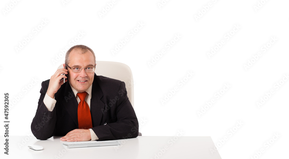 businessman sitting at desk and making phone call with copy spac businessman sitting at desk and making phone call with copy spac