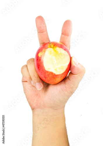 Holding a bite apple isolated