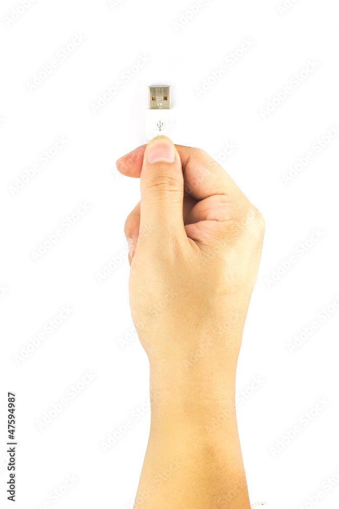 Closeup of hand holding USB cable Isolated on white background Closeup of hand holding USB cable Isolated on white background