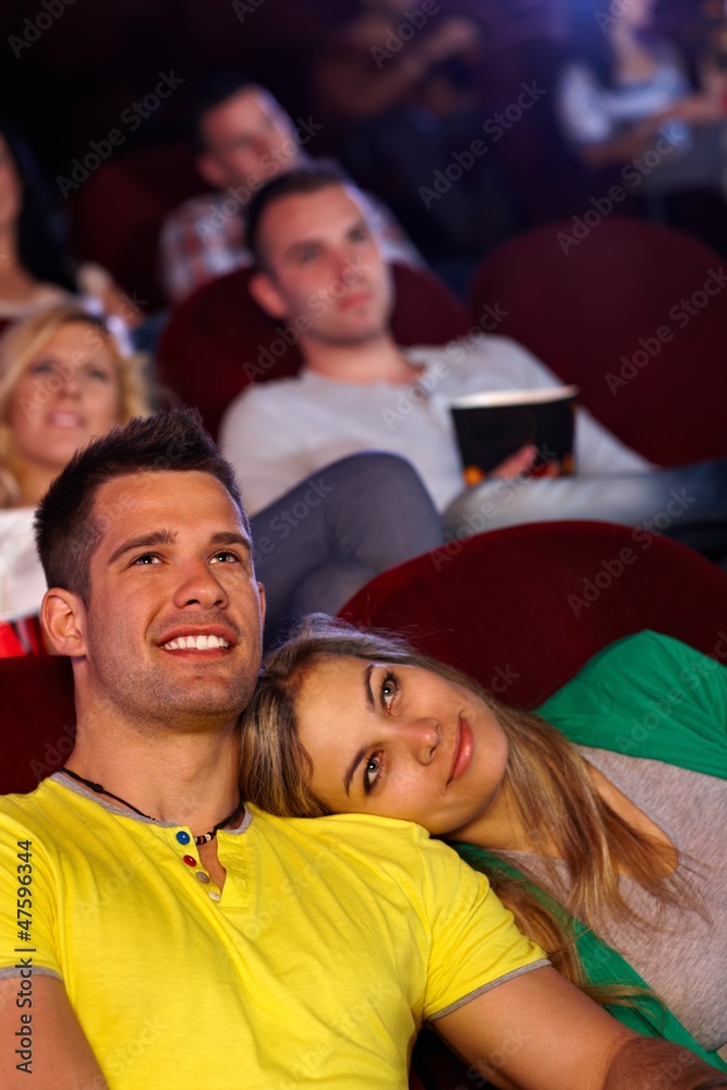 Romantic couple at movie theater Romantic couple at movie theater