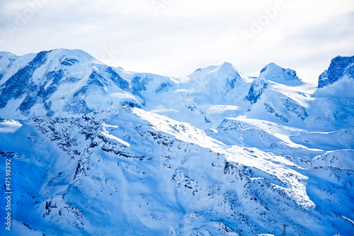Swiss alps landscape with blue snow © rawgroup
