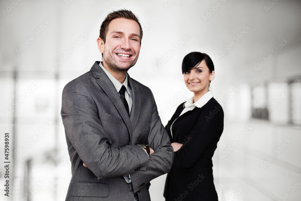 Two business people standing Two business people standing