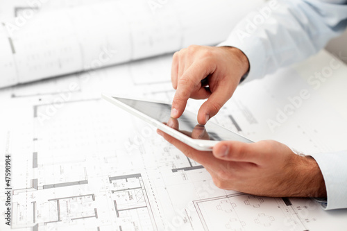 Architect working with digital tablet