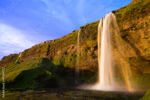 Seljalandfoss waterfall at sunset  Iceland