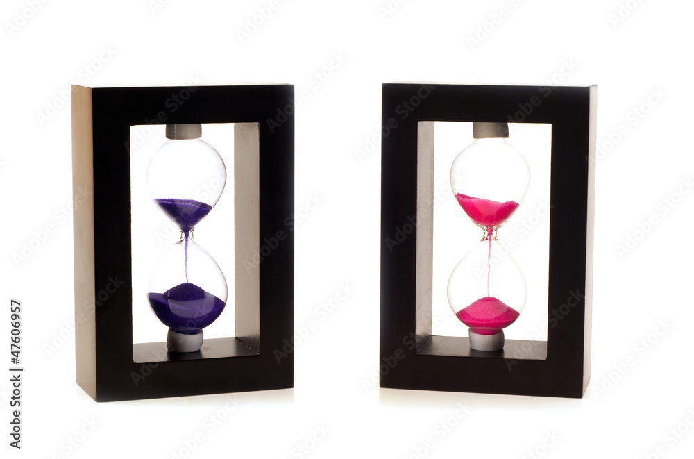 Fototapeta premium sand-glasses on a white background