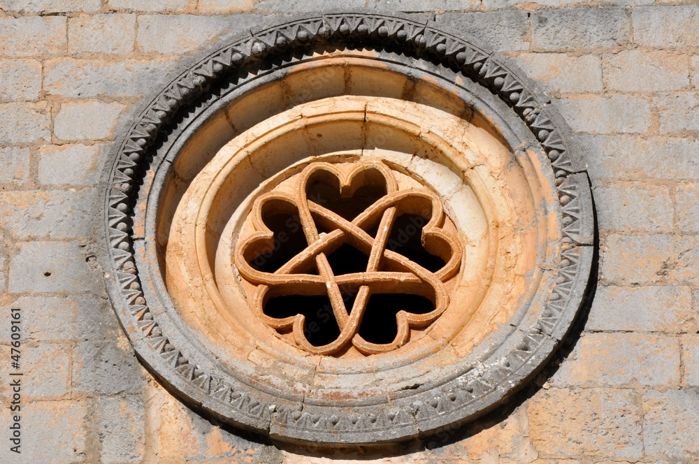 The pentalpha of a rose window, St Bartholomew hermitage, Spain