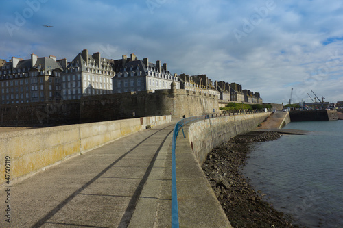 castle walls of Saint Malo old town and port over sea as viewed