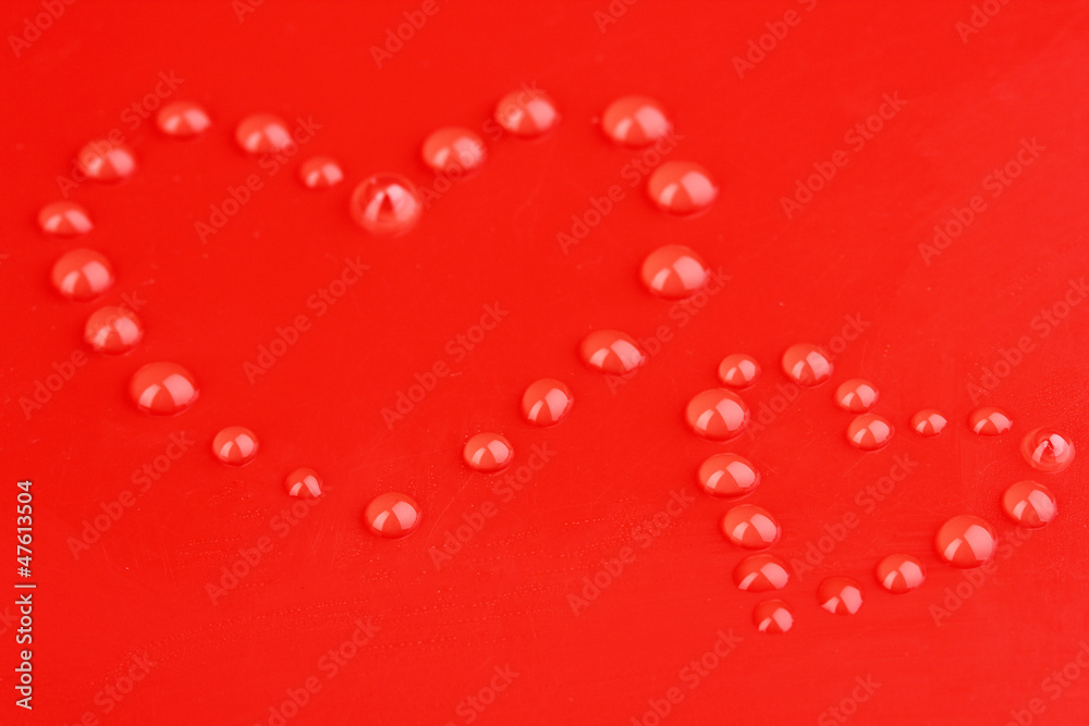 Water drops on red background Water drops on red background