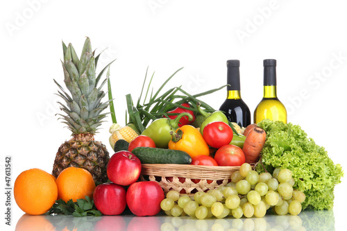 Composition with vegetables and fruits in wicker basket