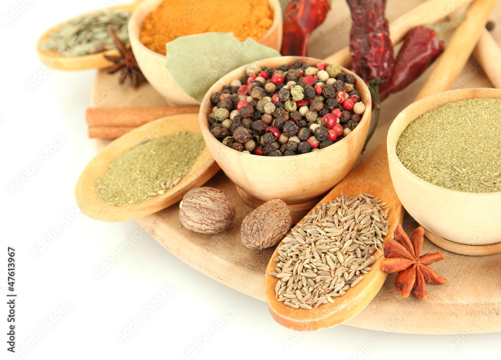 wooden bowls and spoons with spices, isolated on white wooden bowls and spoons with spices, isolated on white
