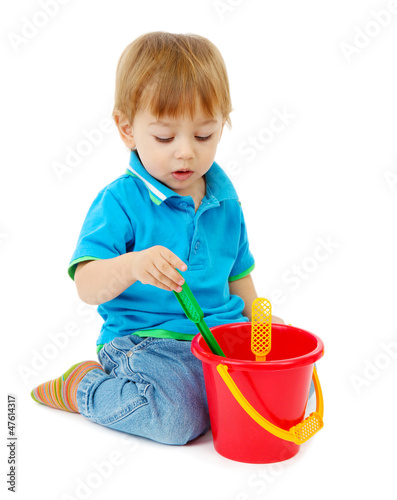 cute little boy with toy bu...