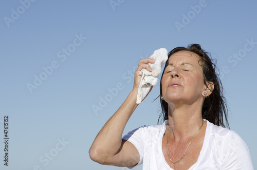 Mature woman menopause stress sweating