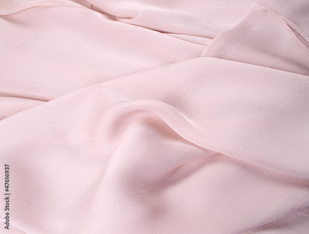 Fototapeta premium light pink silk drape, background or texture