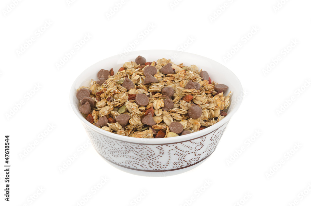 homemade granola with chocolate drops isolated on white homemade granola with chocolate drops isolated on white
