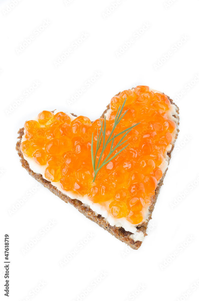 sandwich with red caviar in the form of a heart  isolated