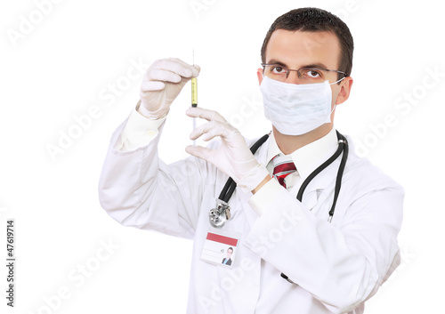 Doctor - with syringe and medication. Isolated.