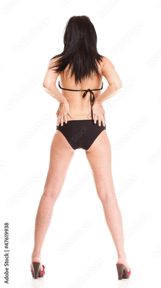 Naklejka premium Portrait of sexy brunette in brown bikini isolated