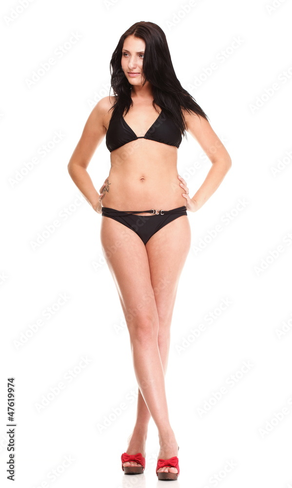 Portrait of sexy brunette in brown bikini isolated Portrait of sexy brunette in brown bikini isolated