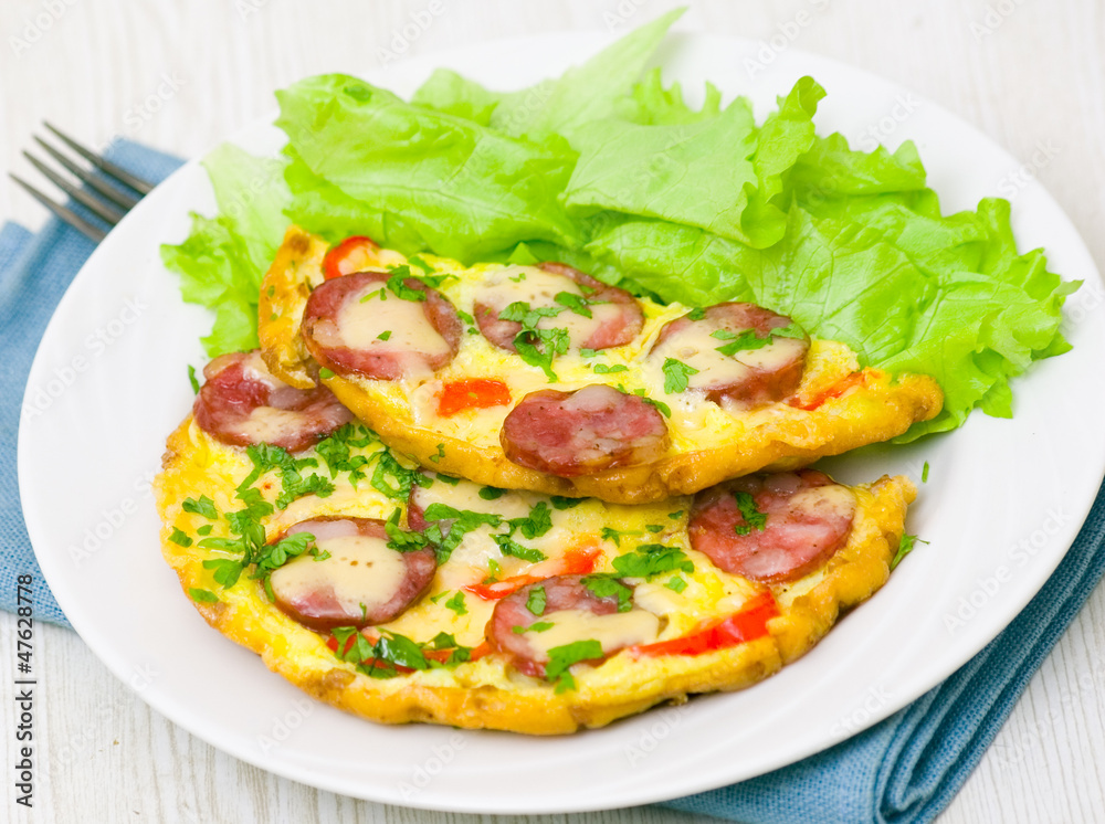 Omelet with sausage and vegetables