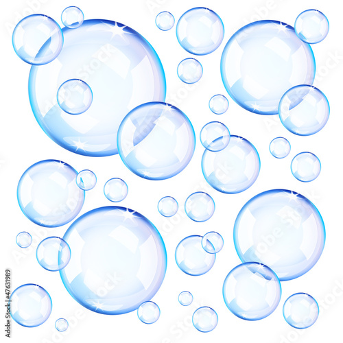Transparent blue soap bubbles photo