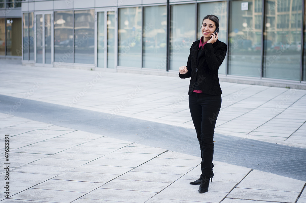 smiling business girl on the phone smiling business girl on the phone
