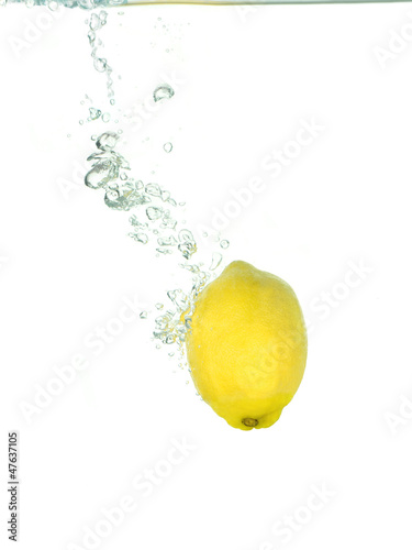 a lemon in clear water