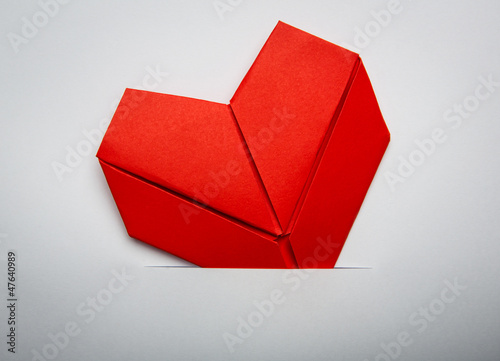 Origami paper heart shape symbol for Valentines day with copy