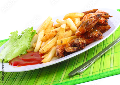 Deep-fried potatoes with fry shrimps. Isolated