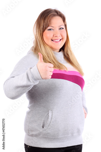 Smiling beautiful blonde woman thumbs up isolated on white photo