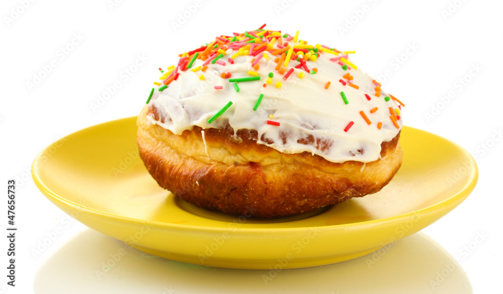 Tasty donut on color plate isolated on white