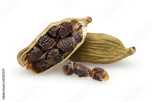 Cardamom seeds on a white background