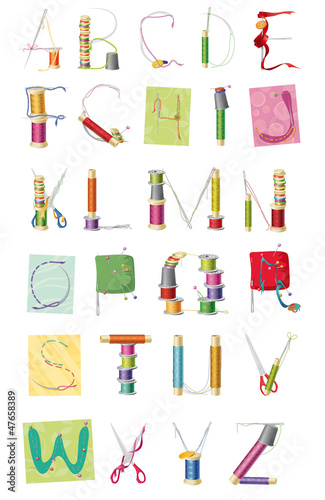 a set of letters  sewing kit