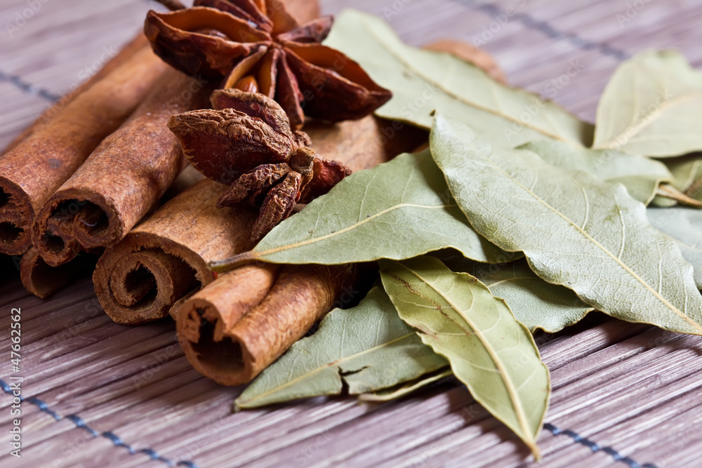 Mixed spices on wooden background