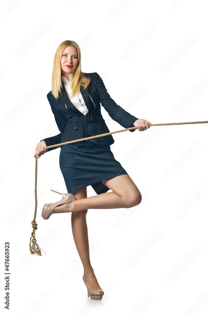 Businesswoman in tug of war concept Businesswoman in tug of war concept