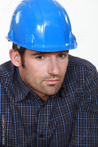 Portrait of tradesman lacking self-confidence © auremar