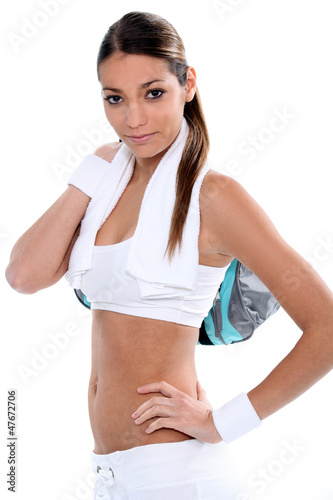 Attractive brunette carrying gym bag