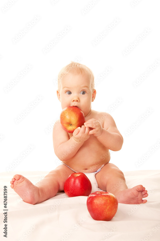 Laughing baby with big red apples Laughing baby with big red apples