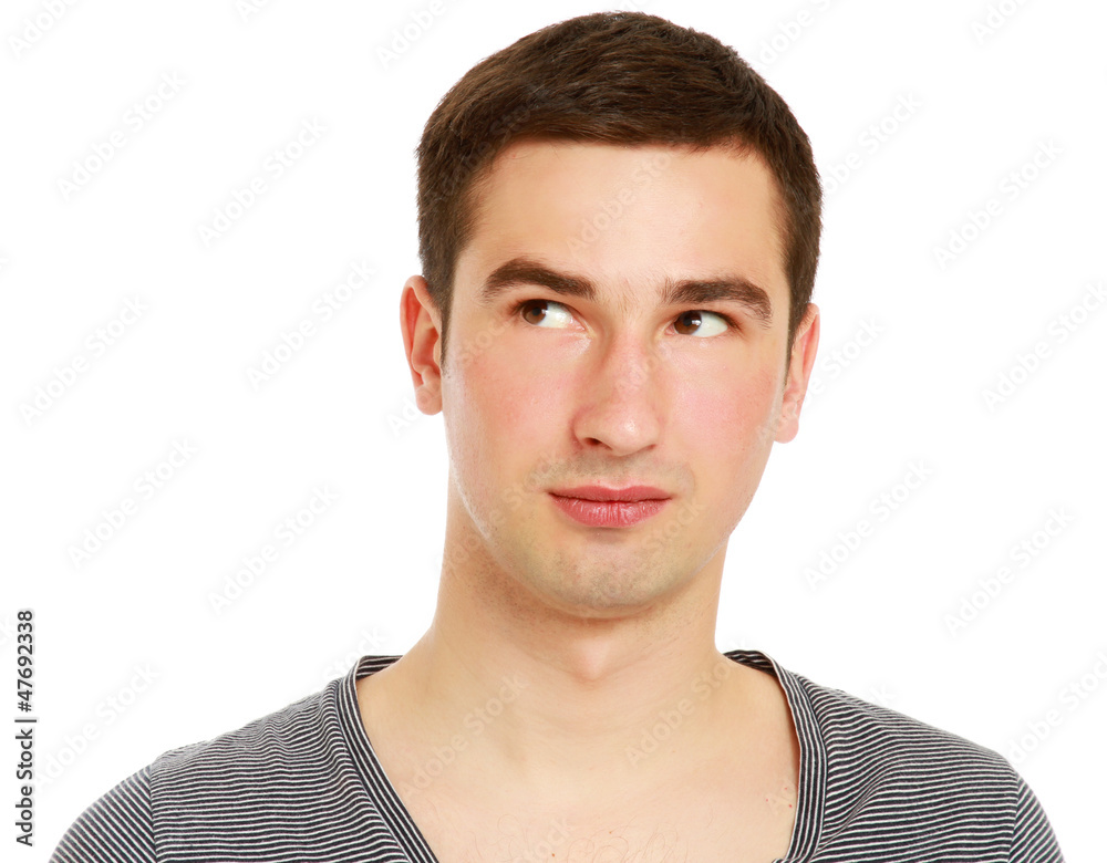 Obraz premium Closeup portrait of a young smiling guy, isolated on white