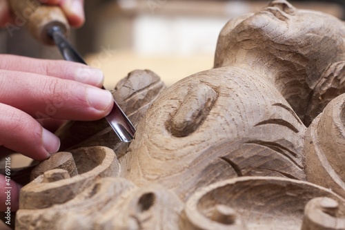 craftsman carving with a gouge Fototapeta