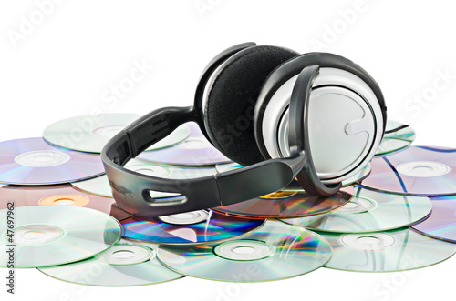 Headphones on the background of the CDs