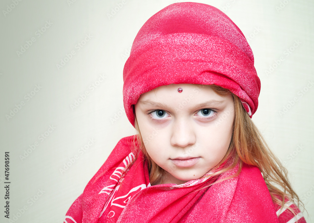 Closeup portrait of little girl in red eastern Clothing Closeup portrait of little girl in red eastern Clothing